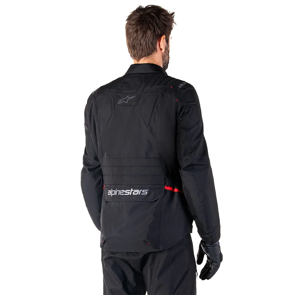 Vista frontal y diseño de calota del ST-1 Impermeable Chaqueta Alpinestars - Moto Garage Miami