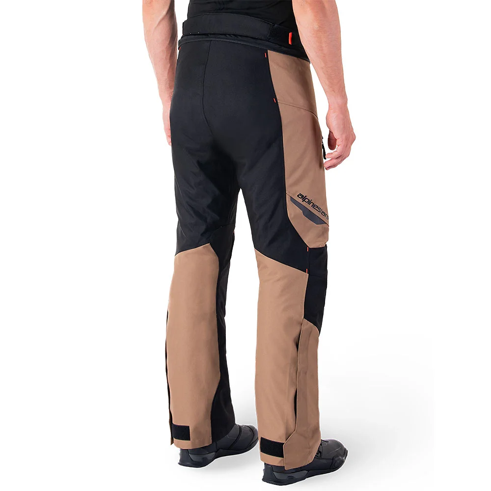 Vista frontal y diseño de calota del ST-1 Impermeable Pant Alpinestars - Moto Garage Miami