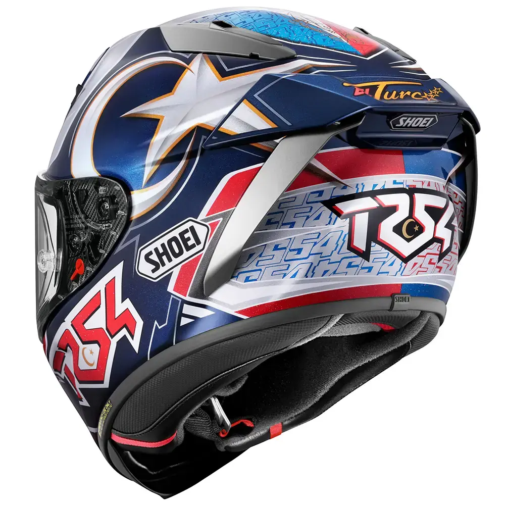 Casco Shoei X-Spirit III vista trasera derecha. Diseño azul, blanco, rojo con estrella grande, logotipos Shoei y 'TSR 254'. Sistema de ventilación y alerones traseros visibles.