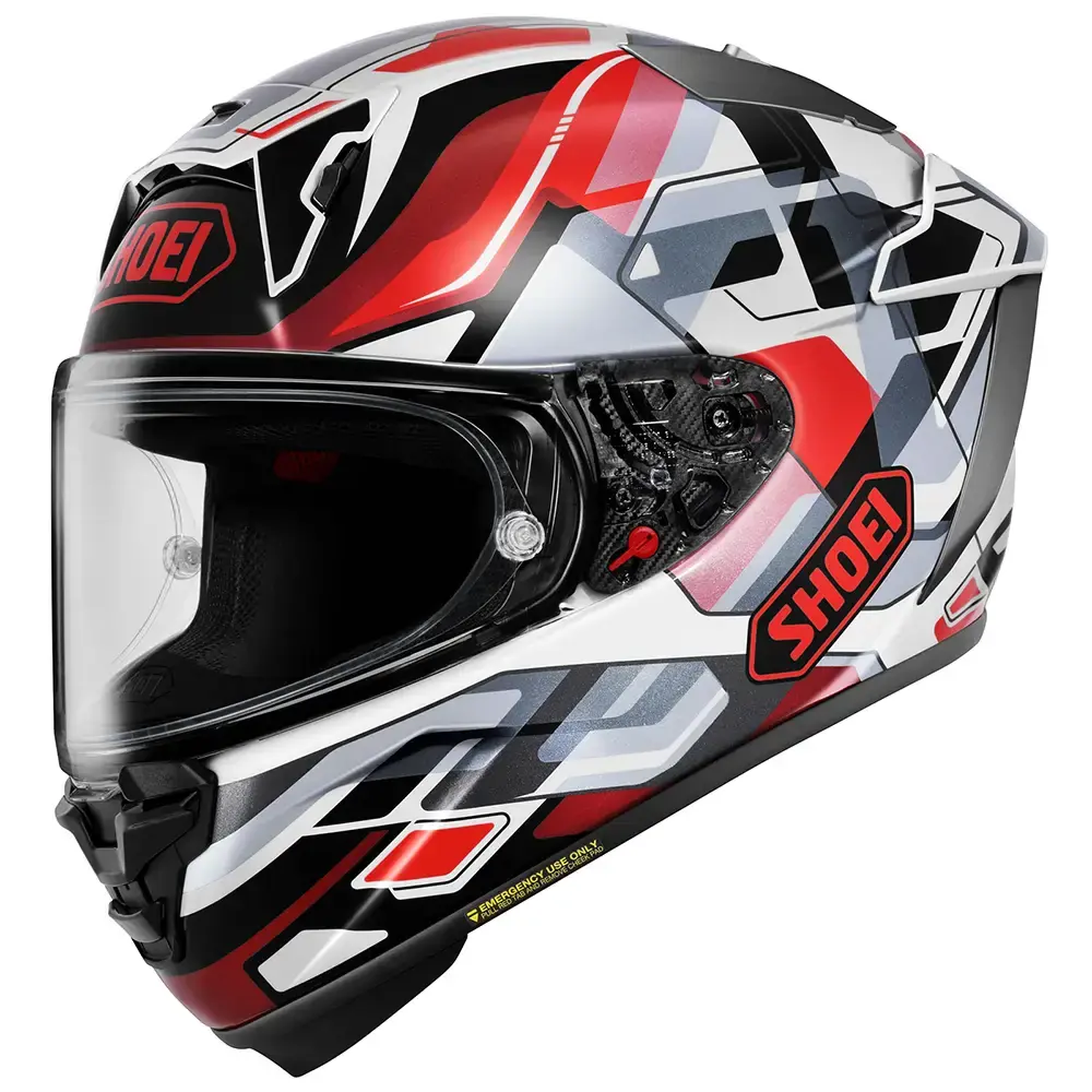 Casco integral de motocicleta Shoei con diseño geométrico en blanco, rojo, negro y gris, visor transparente.